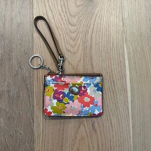 2000s coach floral keychain with a brown leather strap, multicoloured